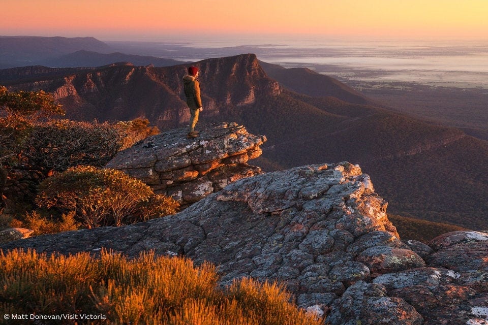 Man looking at the view from Mt William in the Grampians. Image: Matt Donovan/Visit Victoria.